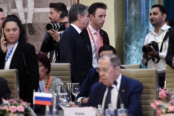 Secretary of State Antony Blinken and Russian Foreign Minister Sergei Lavrov, seated in front, at the G-20 foreign ministers’ meeting. PHOTO: OLIVIER DOULIERY/AGENCE FRANCE-PRESSE/GETTY IMAGES