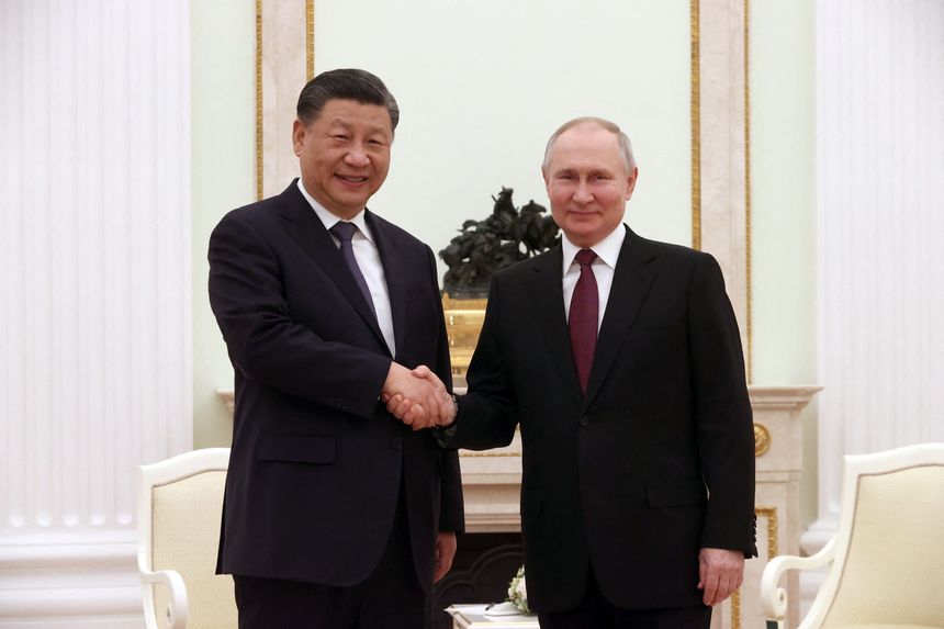 Leaders Xi Jinping and Vladimir Putin share close personal ties. PHOTO: SERGEI KARPUKHIN/AGENCE FRANCE-PRESSE/GETTY IMAGES