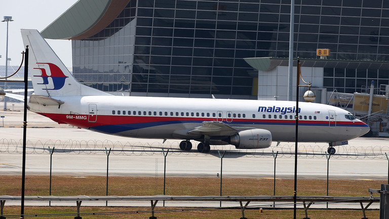 FILE PHOTO. Malaysia Airline passenger jet parked on the tarmac at the Kuala Lumpur International Airport on March 8, 2014 © Getty Images / How Foo Yeen