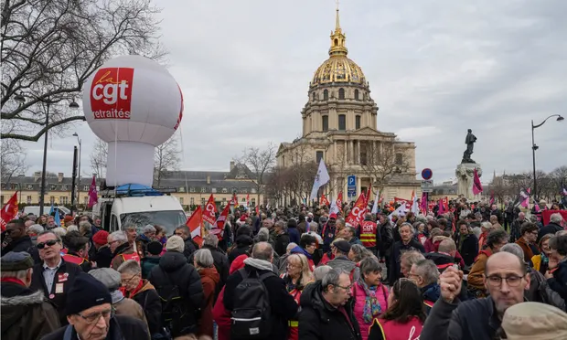 People stage a protest against the retirement bill in Paris, on 20 March. Photograph: Lewis Joly/AP