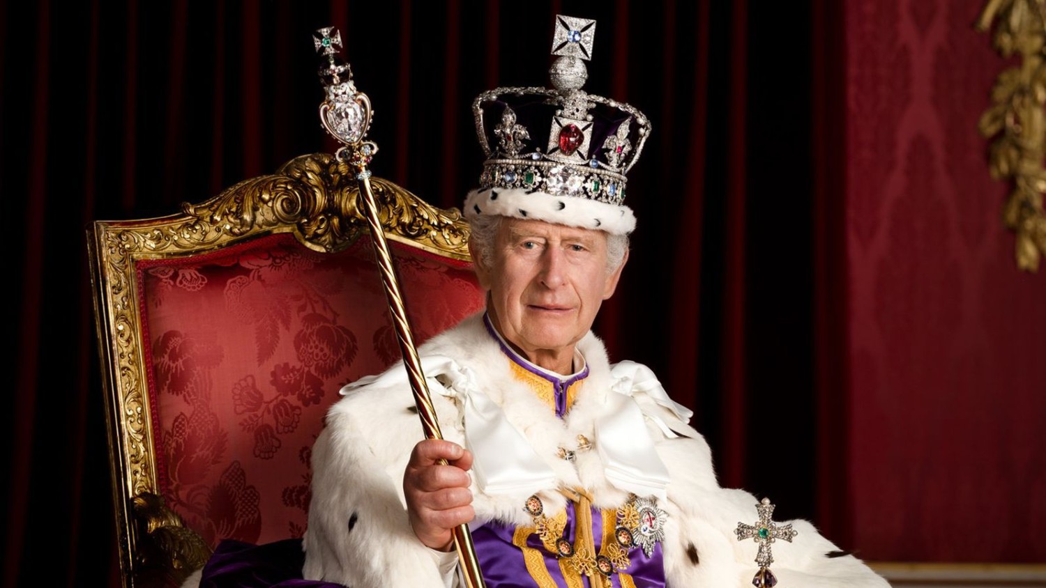 In this photo made available by Buckingham Palace on Monday, May 8, 2023, Britain's King Charles III poses for a photo in full regalia in the Throne Room, London. Hugo Burnand/Royal Household 2023/AP
