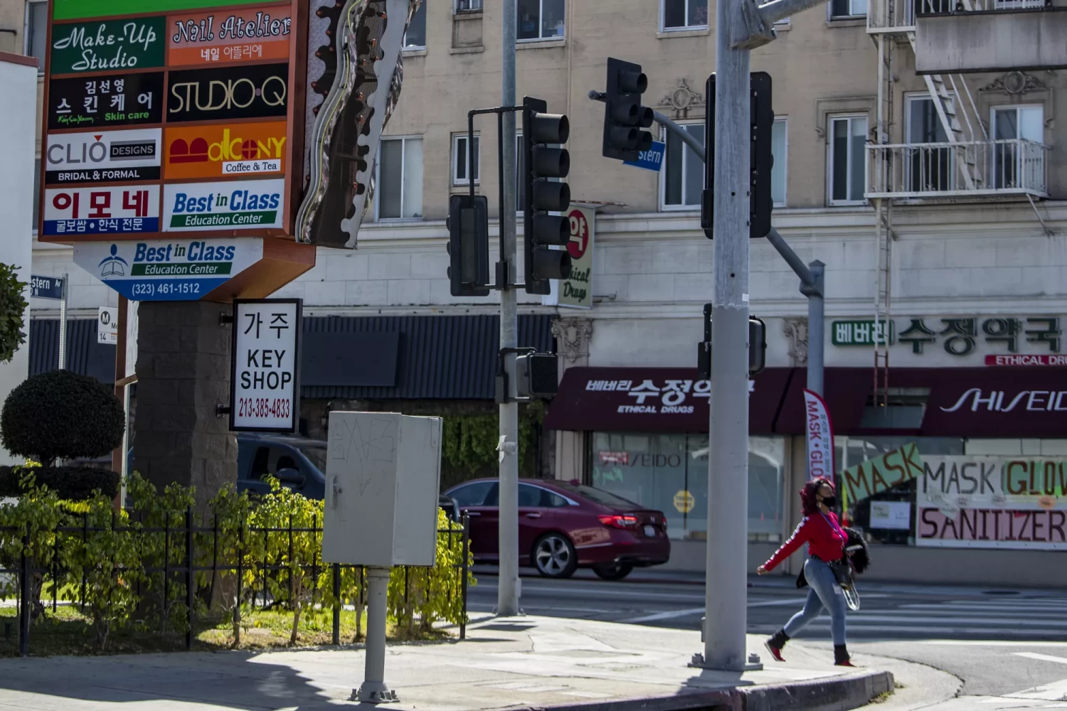 A block on Western Avenue in Koreatown, among many Los Angeles neighborhoods where development has pushed up home prices. (Brian van der Brug / Los Angeles Times)