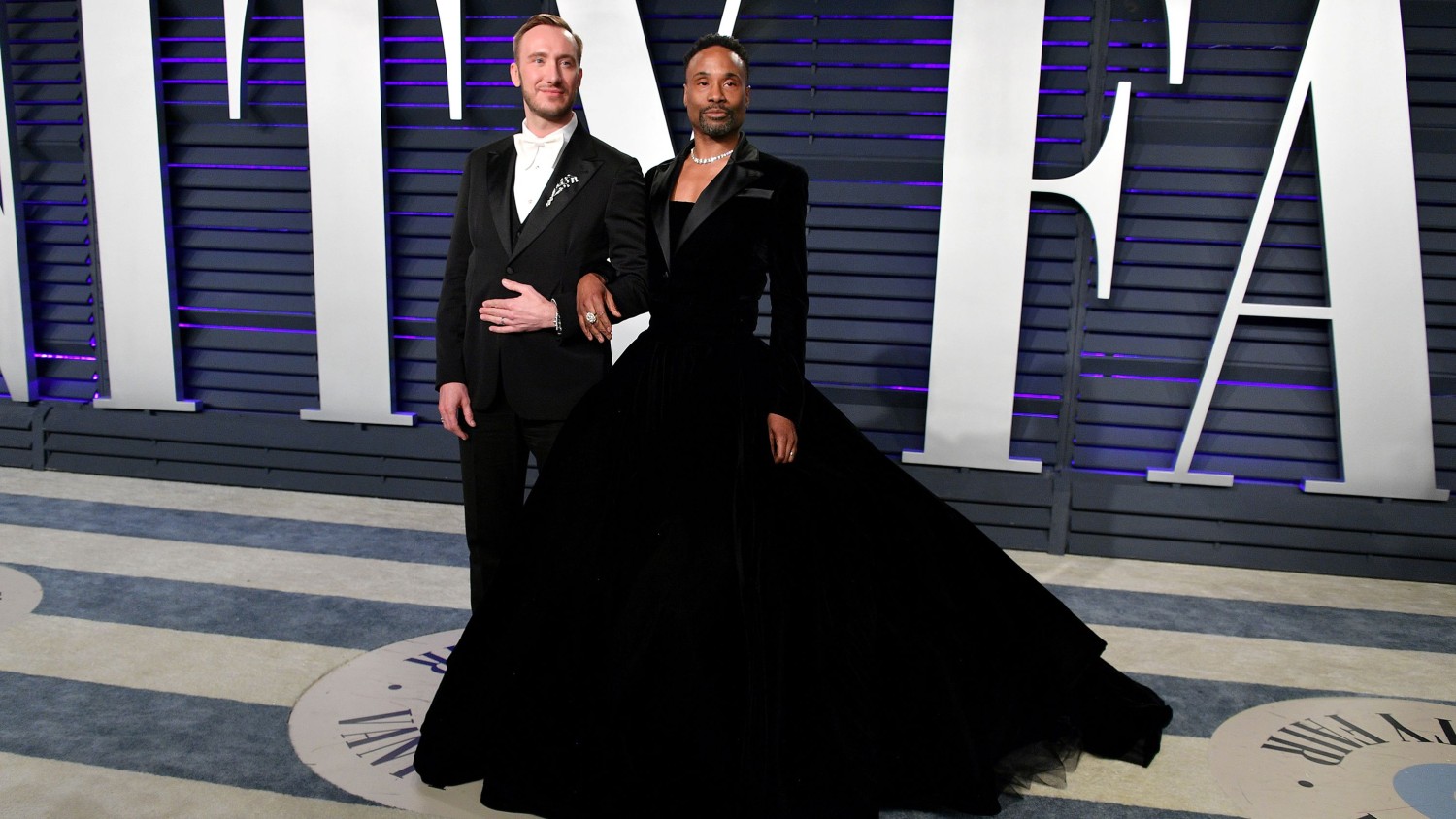 Dia Dipasupil/Getty Images | Adam Smith (L) and Billy Porter attend the 2019 Vanity Fair Oscar Party hosted by Radhika Jones at Wallis Annenberg Center for the Performing Arts on February 24, 2019 in Beverly Hills, California.