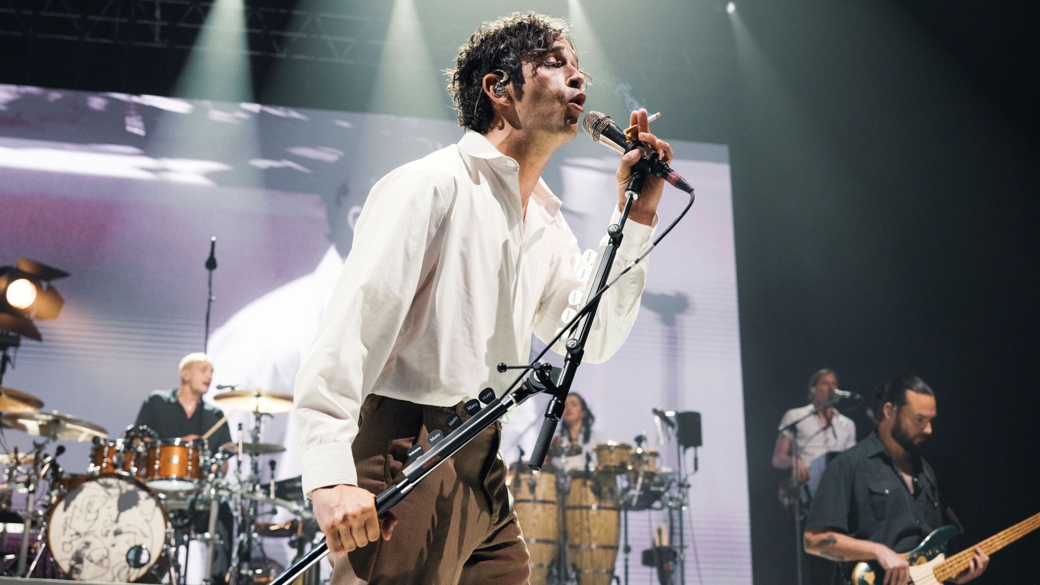 Matty Healy of The 1975 seen performing earlier this year at a concert in Paris. Kristy Sparow/Getty Images