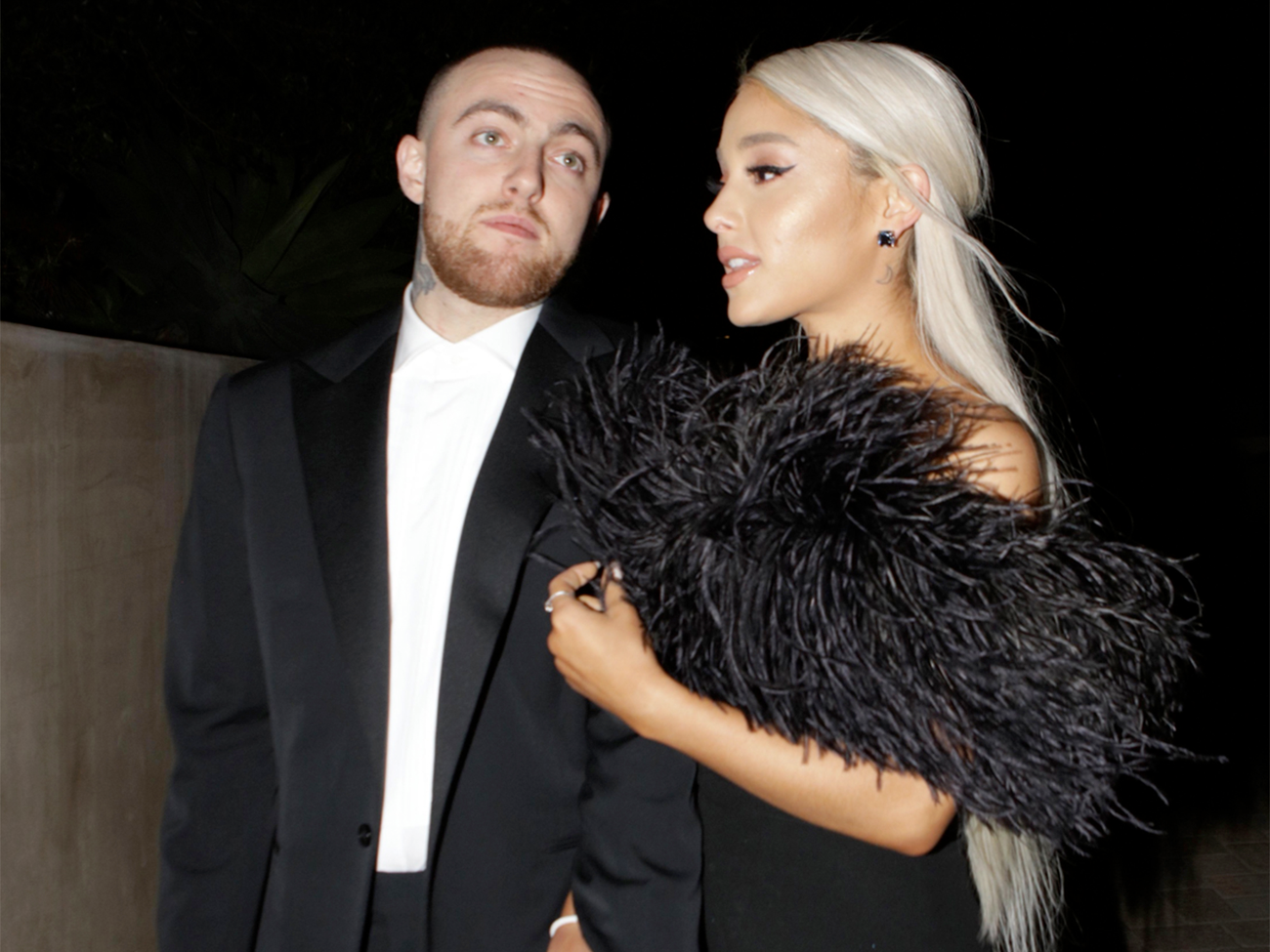 Mac Miller and Ariana Grande attending a 2018 Oscar party.  GC Images