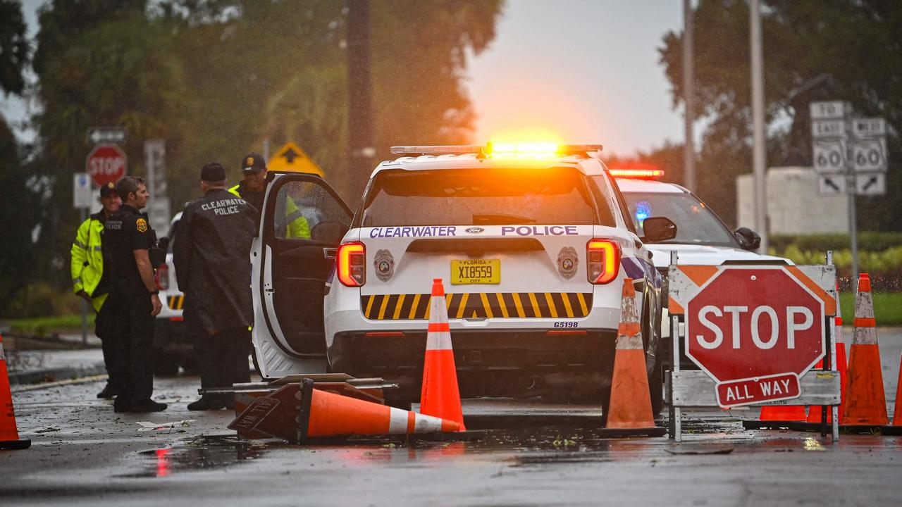 Police block access to a closed bridge in Clearwater, Florida, after Hurricane Idalia made landfall. (Photo by Miguel J. Rodriguez Carrillo / AFP)