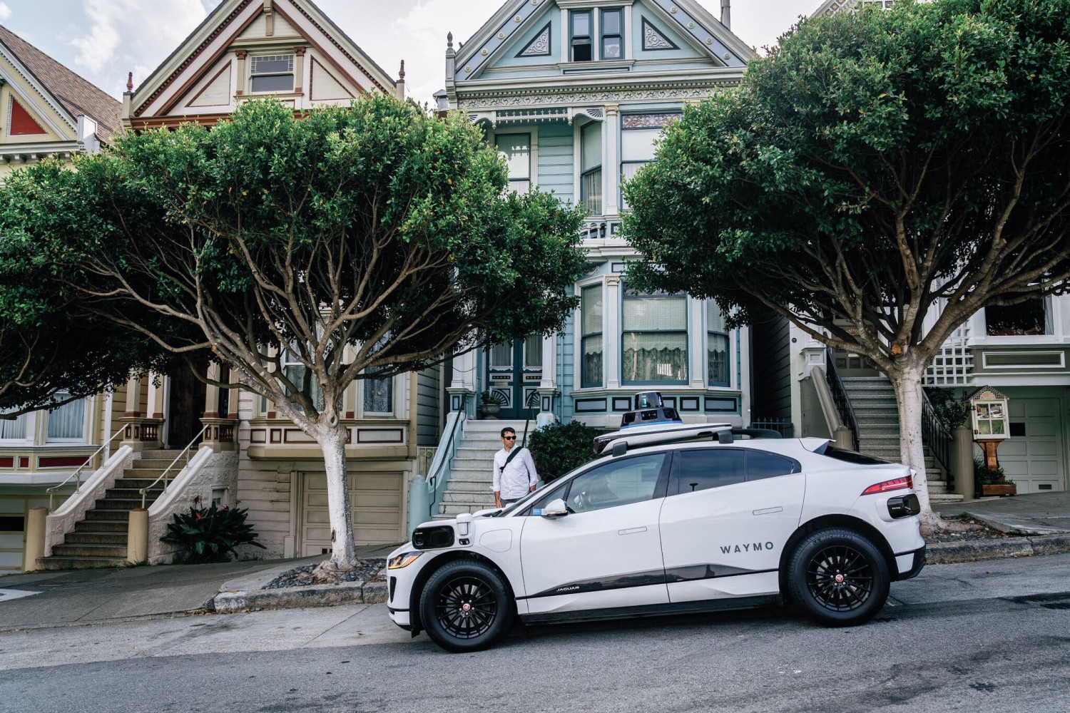 A Waymo driverless car arriving in front of the Painted Ladies on Monday.Credit...Andri Tambunan for The New York Times