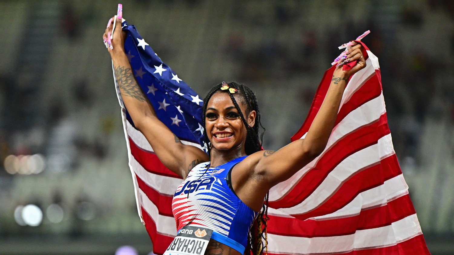 Sha'carri Richardson celebrates after running the anchor leg of the 4x100m final at the World Athletics Championships on Saturday, leading the US team to a gold medal. Marton Monus/Reuters