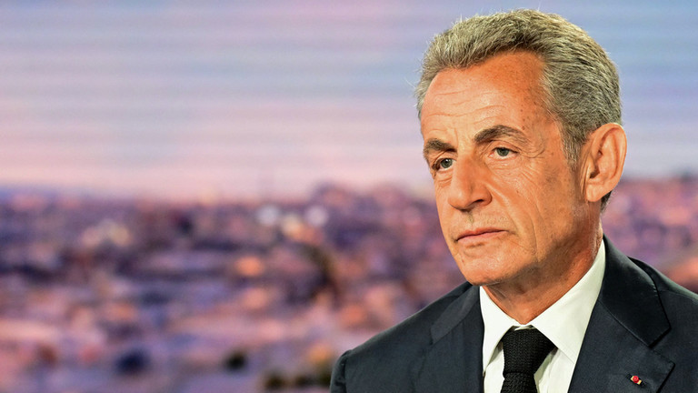 Former French President Nicolas Sarkozy looks on prior to an interview in the evening news broadcast of French TV channel TF1, on August 23, 2023. ©  Emmanuel DUNAND / AF