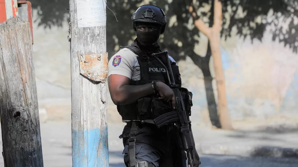 REUTERS / A police officer stands guard in Haiti's capital Port-au-Prince
