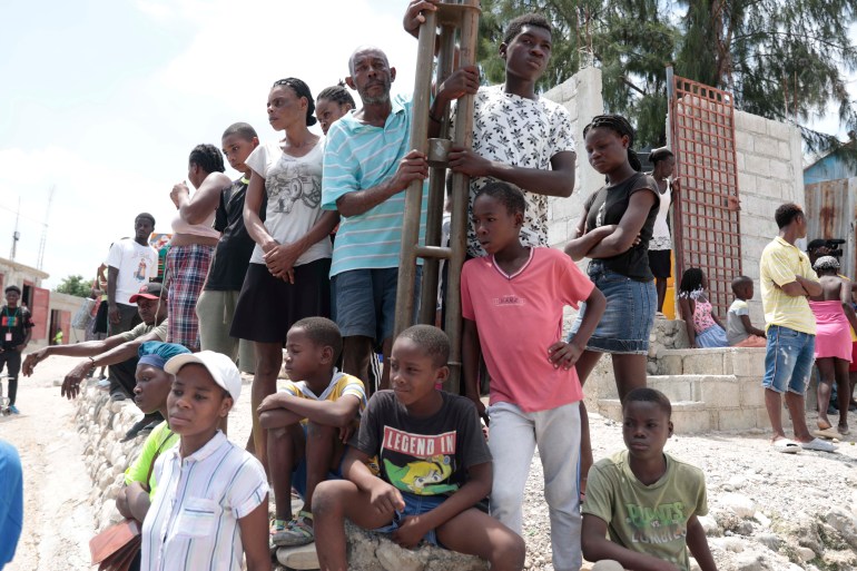 Community members gather on August 27, after a religious march turned deadly in the neighbourhood of Canaan in Port-au-Prince, Haiti [Odelyn Joseph/AP Photo] Published On 29 Aug 2023