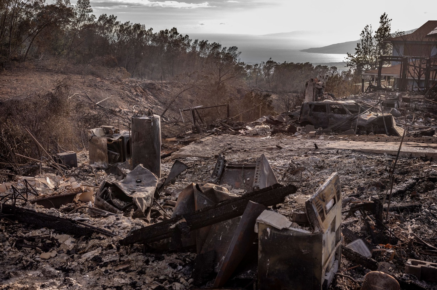 Ruins of a home in the small hillside town of Kula on Aug. 12, 2023. David Butow for TIME