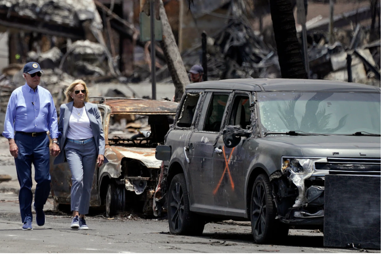 President Biden and first lady Jill Biden on Monday tour areas in Lahaina that were devastated by the wildfires that swept Maui this month. (Evan Vucci/AP)