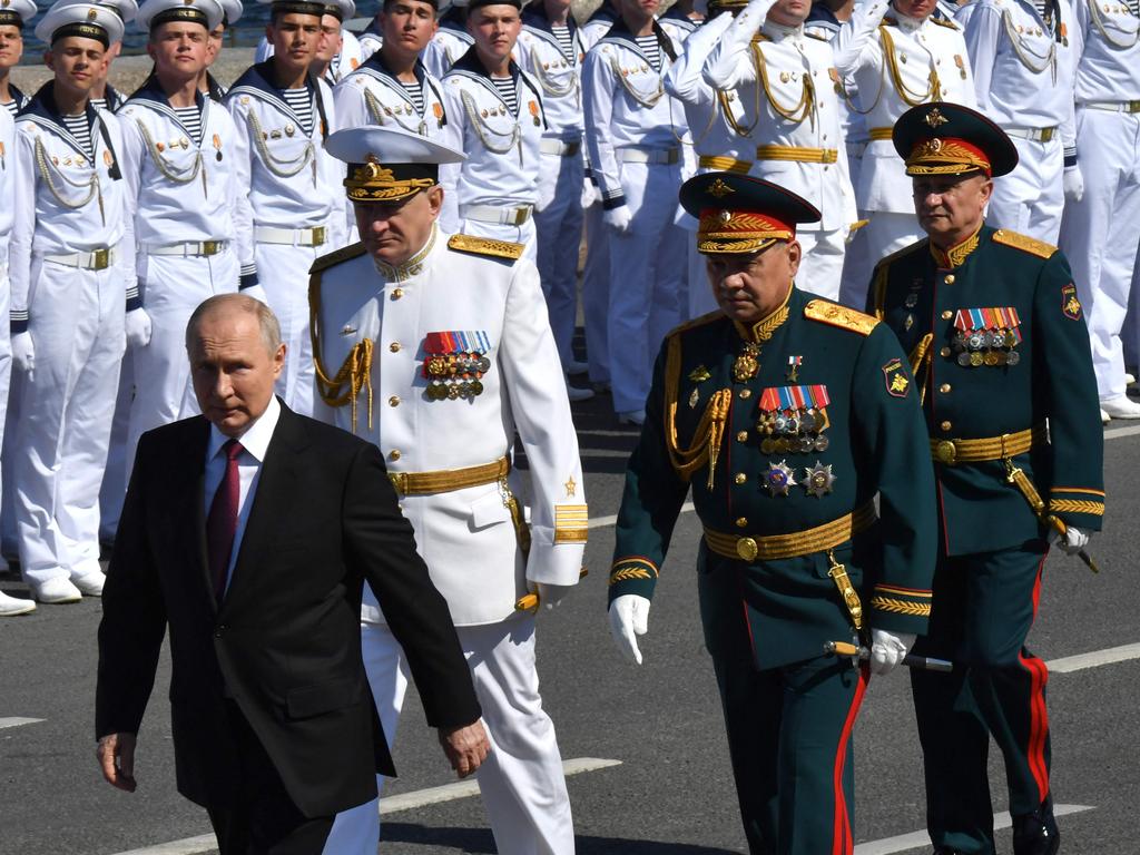Russian President Vladimir Putin, accompanied by Defence Minister Sergei Shoigu.