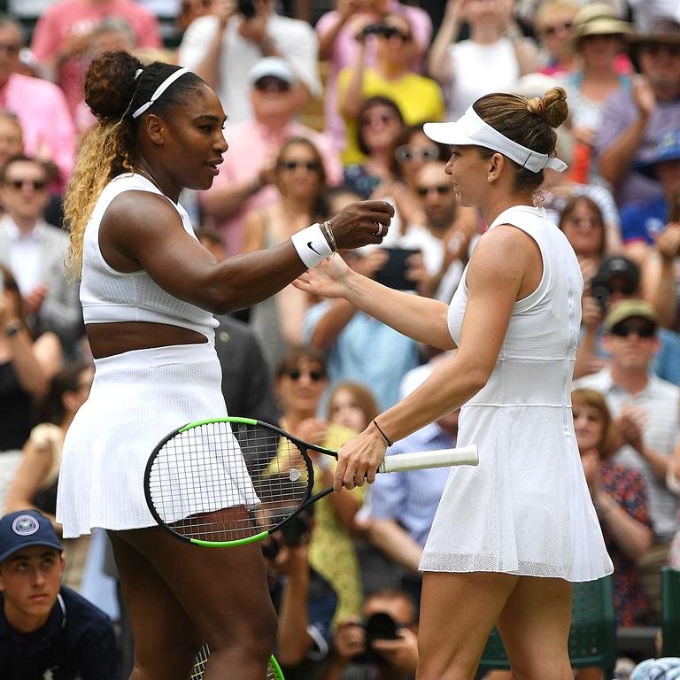 Williams and Halep embrace at the net after the 2019 Wimbledon final. (Photo by Shaun Botterill/Getty Images)