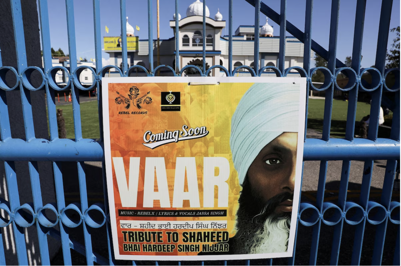 A sign outside the Guru Nanak Sikh Gurdwara in Surrey, British Columbia, where Hardeep Singh Nijjar was killed. (Chris Helgren/Reuters)