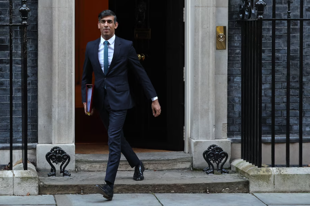 British Prime Minister Rishi Sunak leaves 10 Downing Street on Wednesday to take part in the weekly session of Prime Minister's Questions in the House of Commons. (Daniel Leal/AFP/Getty Images)