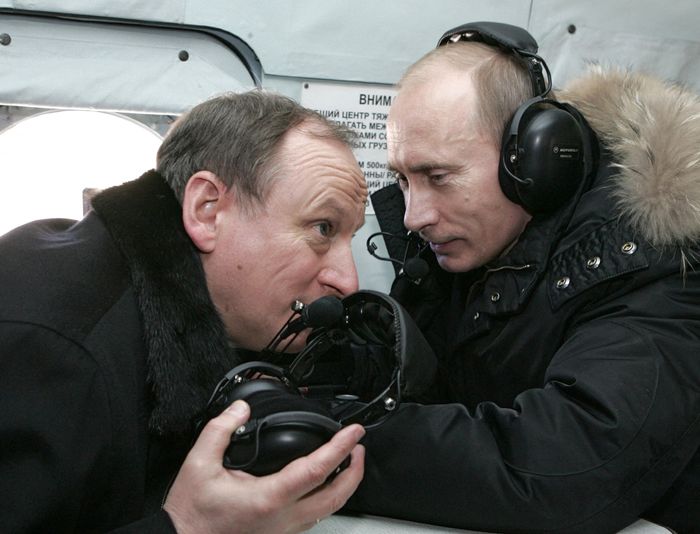 Patrushev and Putin on a helicopter to visit a military outpost in Nalchik, Russia, near Chechnya, in 2008. PHOTO: MIKHAIL KLIMENTYEV/RIA NOVOSTI/AFP/GETTY IMAGES