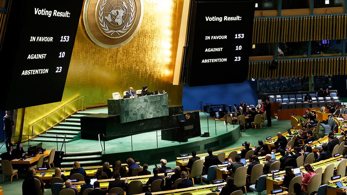 The results of a draft resolution vote are seen on a screen as the UN General Assembly holds an emergency special session on the Israel-Hamas war at the United Nations headquarters in New York on December 12, 2023. Michael M. Santiago/Getty Images