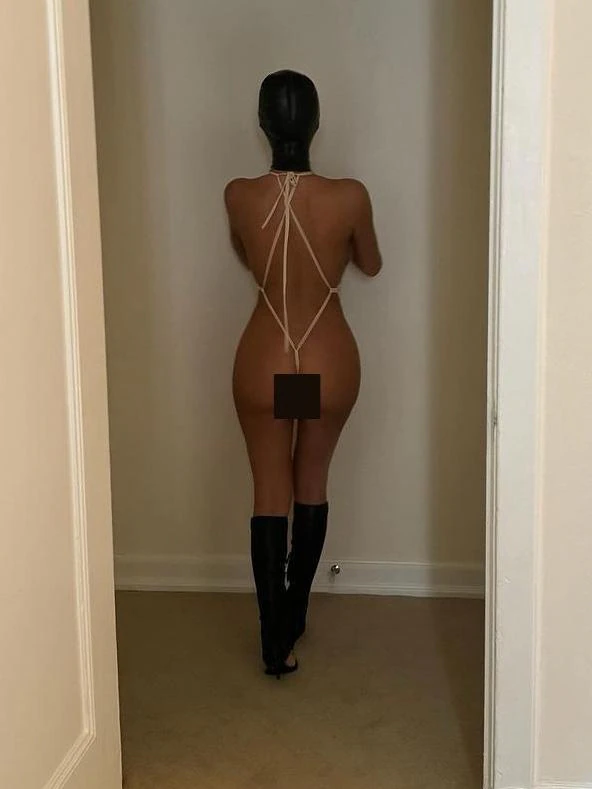 Censori was pictured cooking in a face mask and skimpy swimsuit. Picture: Instagram/kanyewest