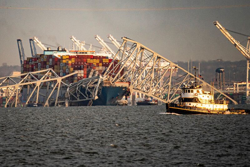 The collapsed Francis Scott Key Bridge after being struck by the Dali container ship, in Baltimore, on March 26.Photographer: Al Drago/Bloomberg