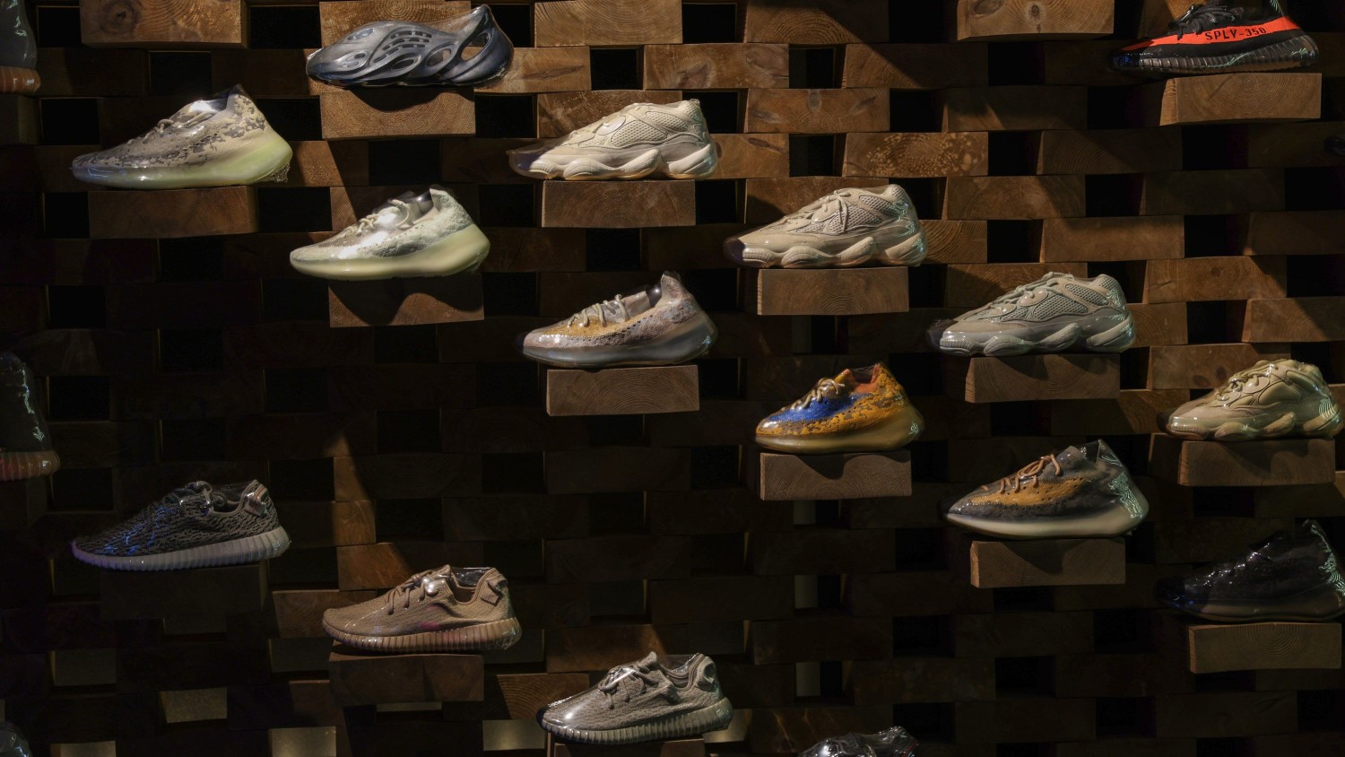 Adidas Yeezy trainers inside the Presented By sneaker resale store in London, pictured in August 2021. Hollie Adams/Bloomberg via Getty Images