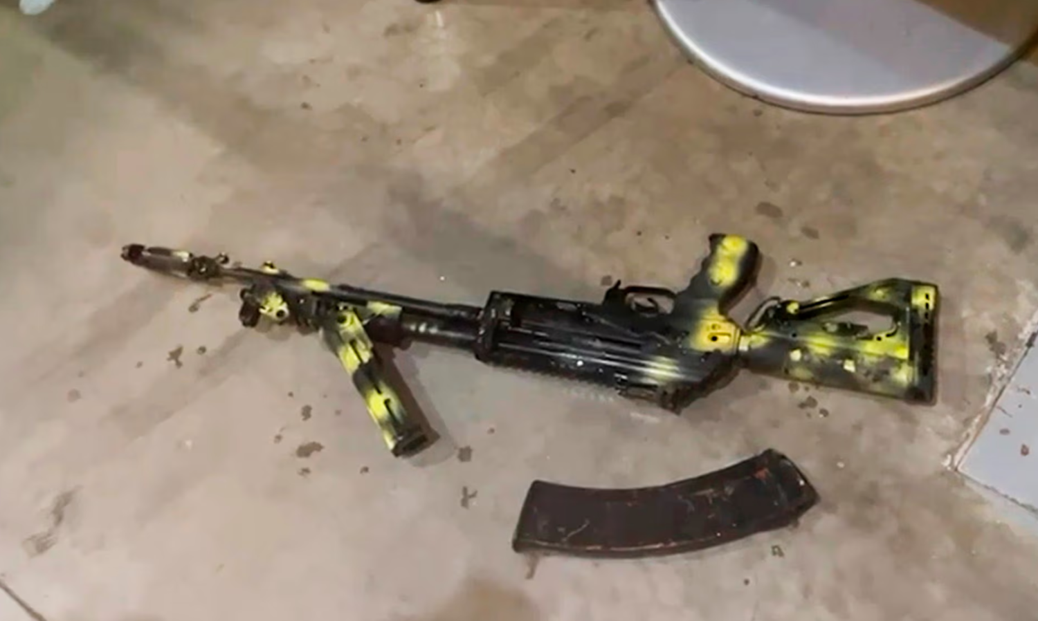 A Kalashnikov assault rifle lies on the ground at the Crocus City Hall. Photograph: AP