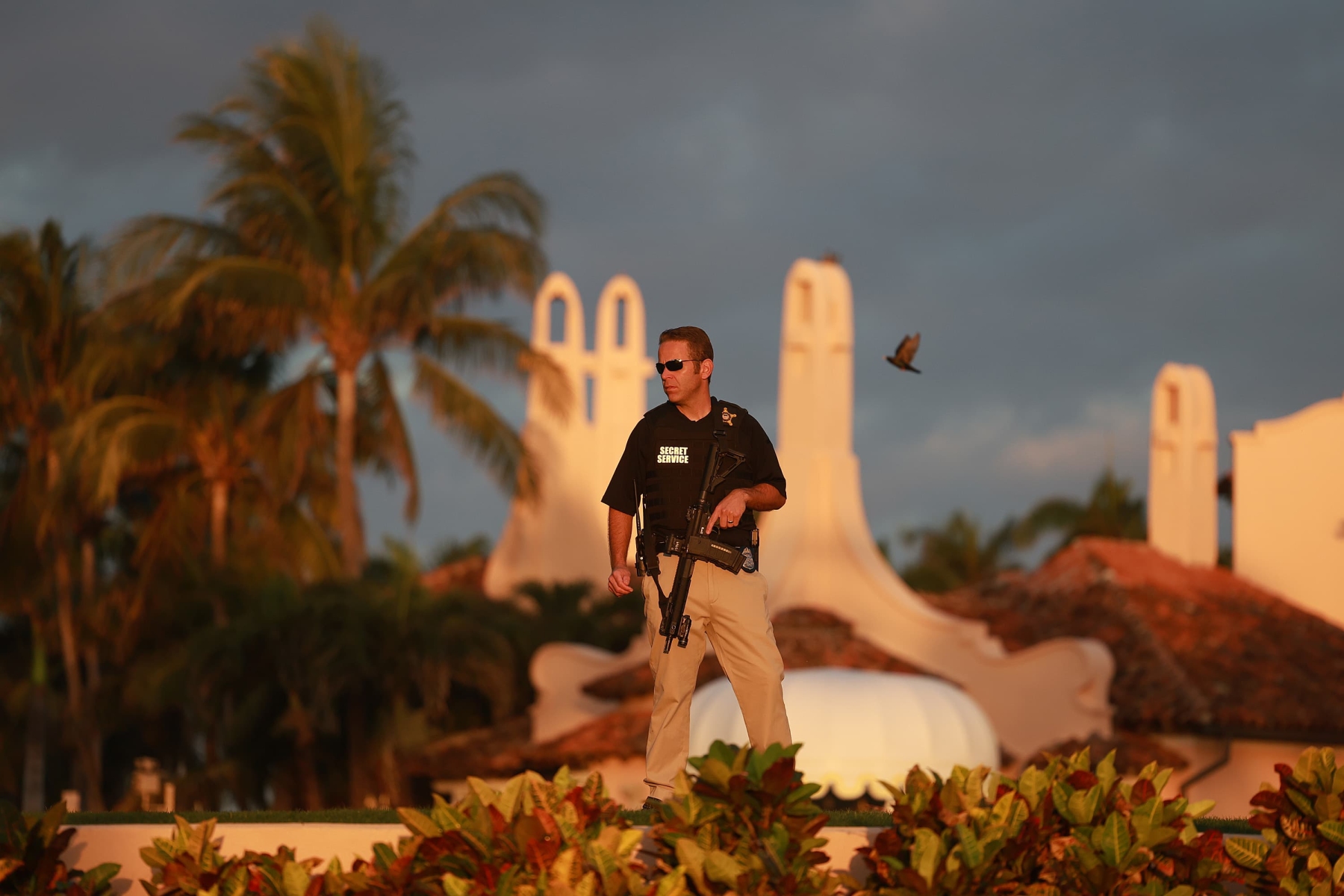 A Secret Service agent guards the Mar-a-Lago home of former President Donald Trump on March 21, 2023 in Palm Beach, Florida. Joe Raedle | Getty Images