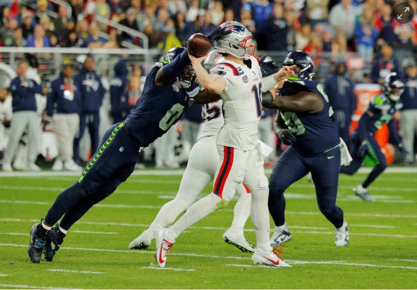 The Seahawks’ swarming defense never let Drake Maye get comfortable on Sunday. Photograph: Mike Blake/Reuters