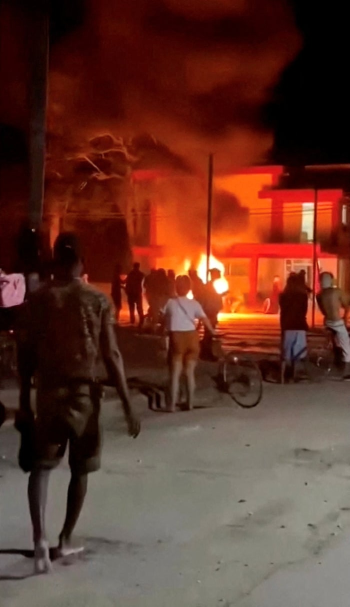 Protesters built a bonfire outside a Communist Party office in Cuba, in an image from video. Reuters