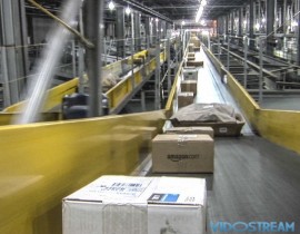 Packages rumble along miles of conveyors on the way to their final destination.