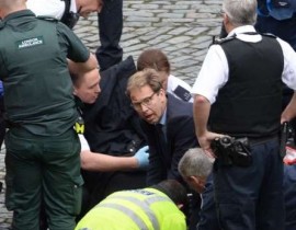 MP Tobias Ellwood helps at the scene of the stabbing of the police officerPA MP Tobias Ellwood tried to help save the officer