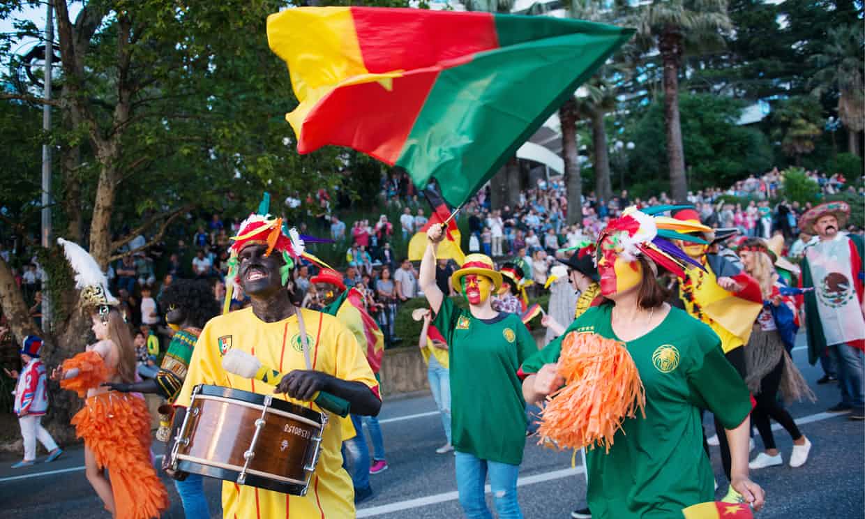 Some participants in the Carnaval Sochi Fest 2017 parade wore blackface, while others carried bananas. Photograph: Artur Lebedev/TASS