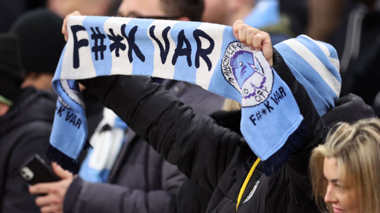 A Manchester City fan makes their feelings clear on VAR. Robbie Jay Barratt - AMA/Getty Images