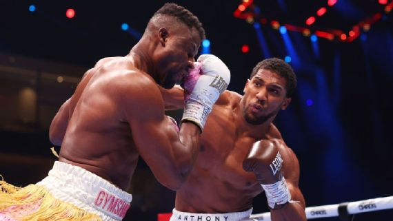 Anthony Joshua floored Francis Ngannou three times Friday night, ending their fight with a perfectly placed straight right in Round 2. Richard Pelham/Getty Images